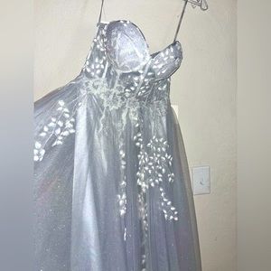 Custom made and tailored prom dress. A light colored, hazy, baby blue dress.